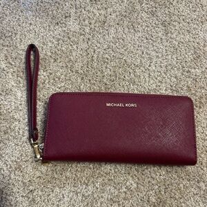 Michael Kors accordion zip wallet maroon leather